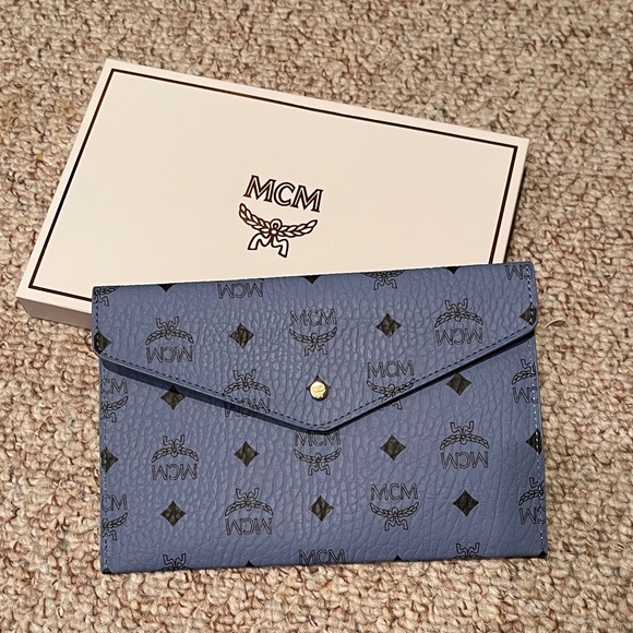 MCM Handbags - MCM Blue Monogram Leather Clutch GWP